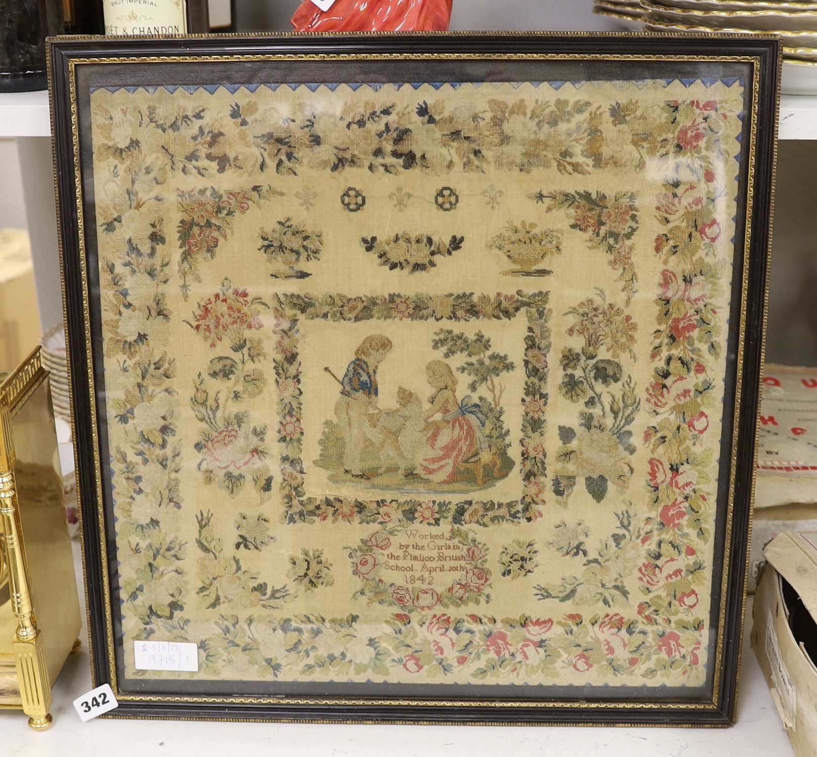 A Victorian sampler worked with flowers and central cartouche, worked by the girls in the Pimlico British School, April 20th 1842, sampler 46 x 46cm